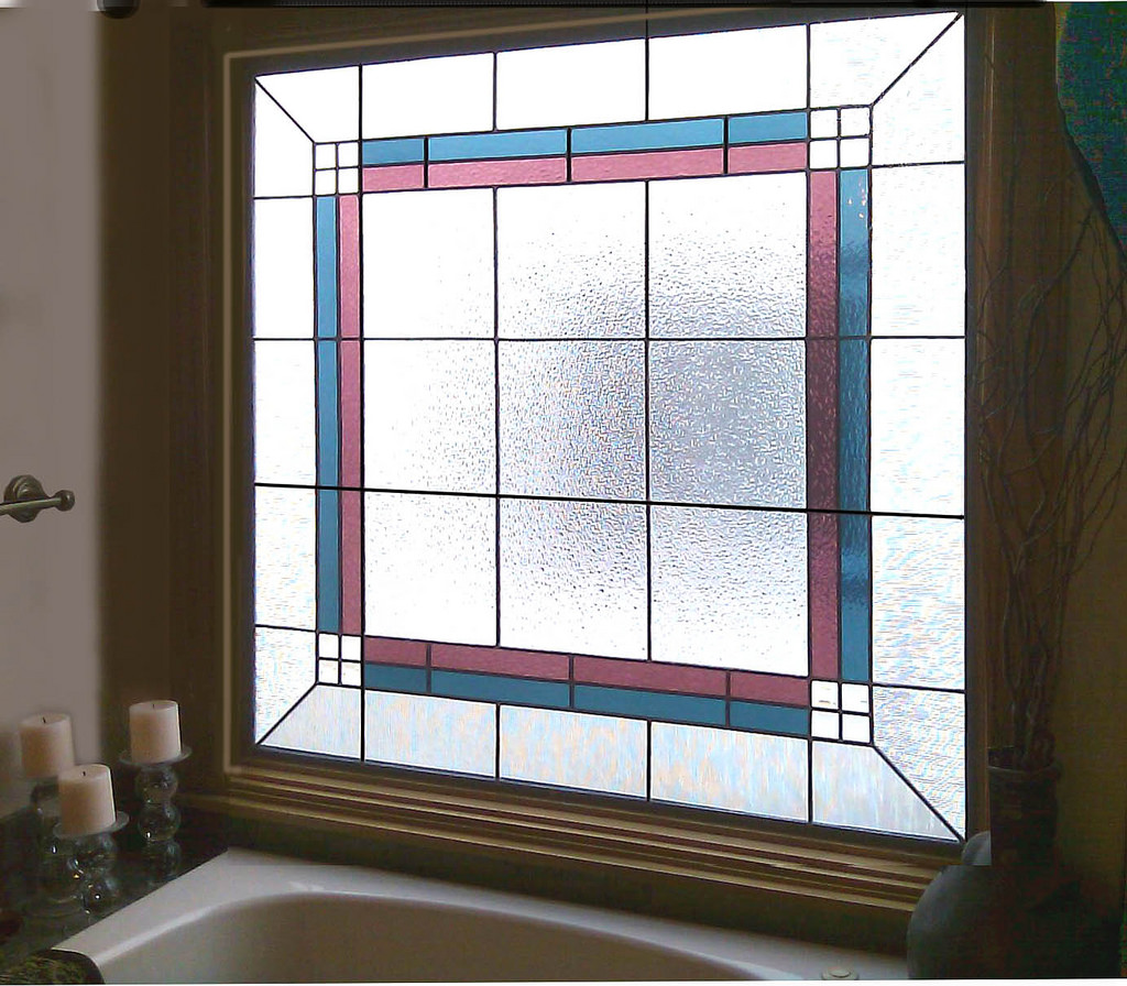 clear stained class with different colors of stained glass combined with bathroom natural light