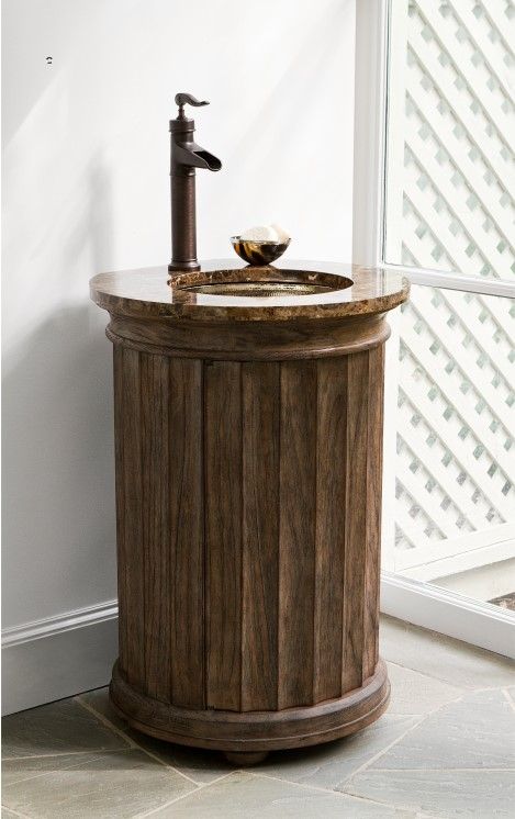 A column peestal single sink bathroom vanity