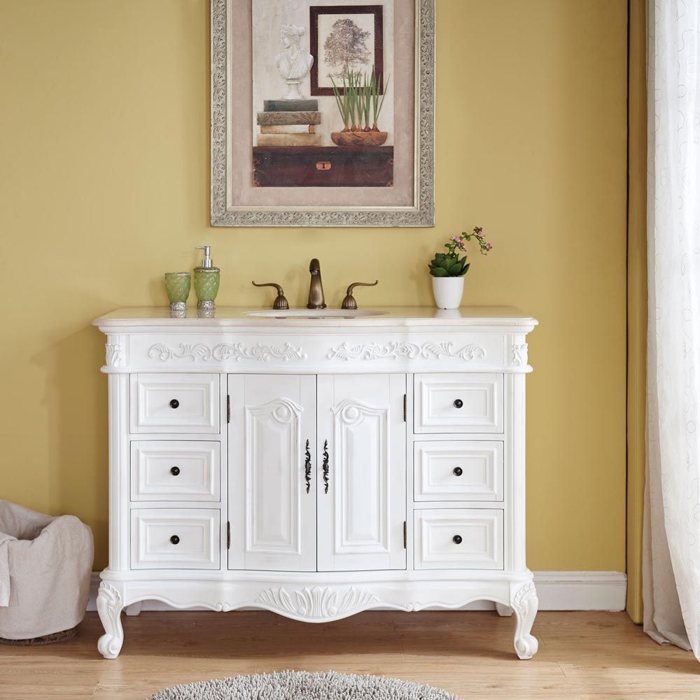 The Cortona single sink bath vanity, traditional style with transitional design. Cottage white finish.