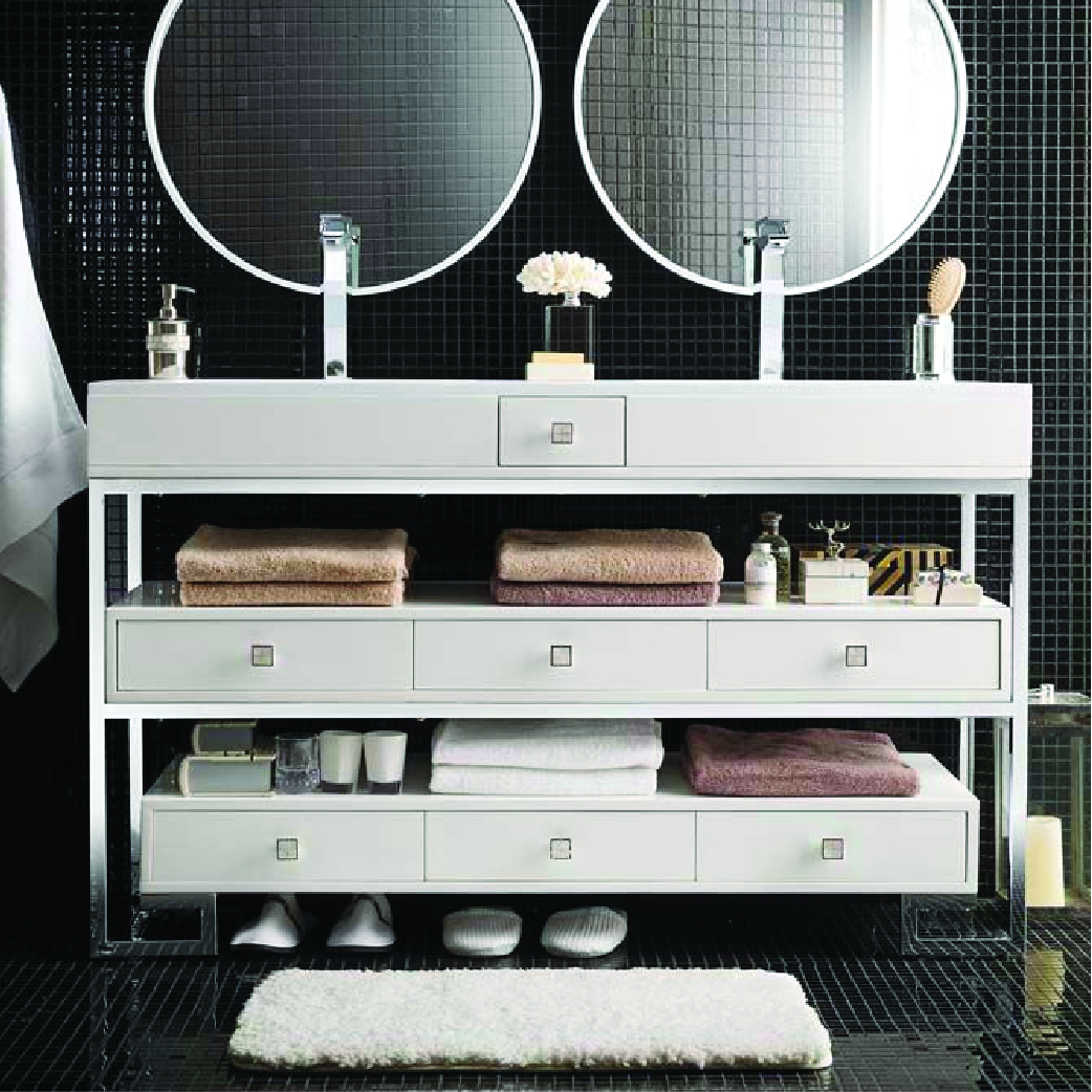 simple all white double sink standing vanity with cubby space and drawers