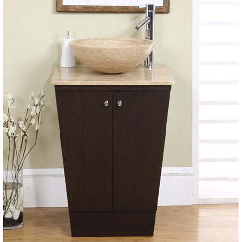 This pedestal vanity cuts a striking figure in any bathroom, featuring earthy brown hues and elegant bronzed fixtures.
